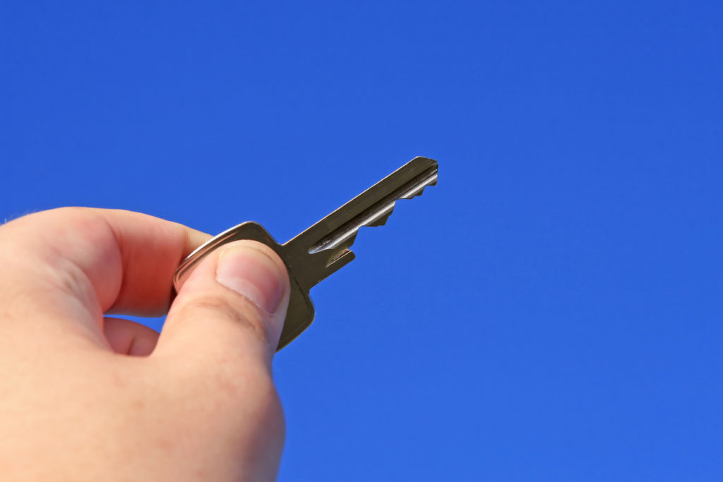 Symbolic key to property, real estate, success, or business